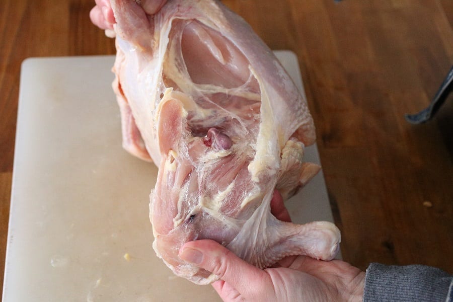 cutting up a chicken removing the quarter