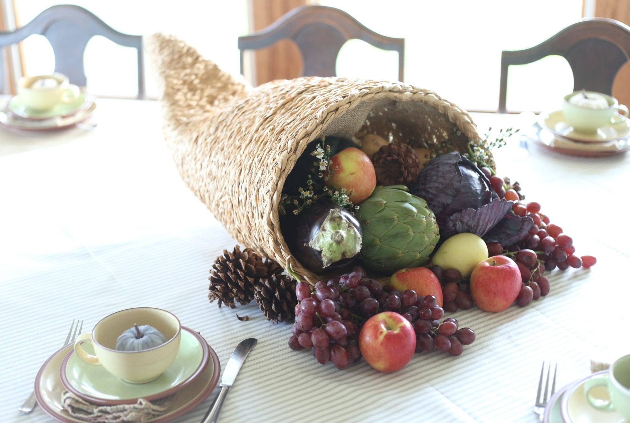 veggies spilling out of cornucopia