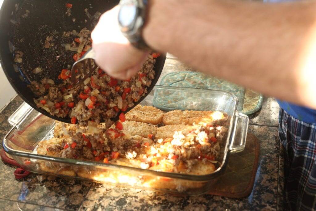 layering sausage for egg casserole