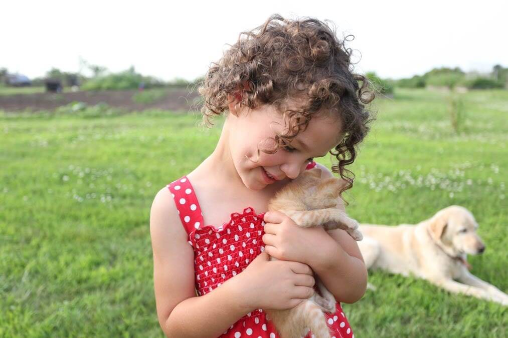 girl in shirred sundress kitten