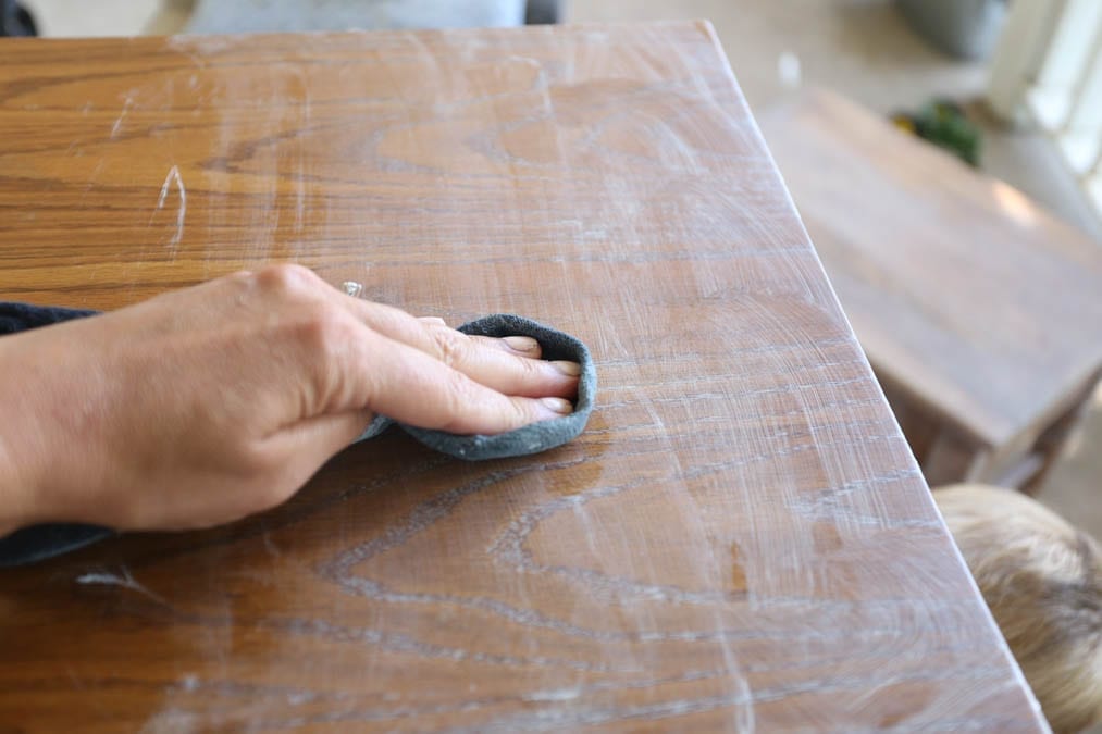 working the lime wax into the grain