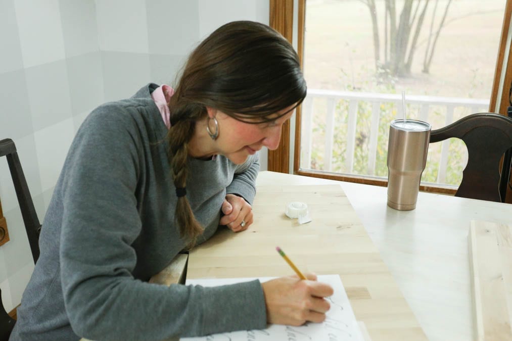 tracing image onto charcuterie board