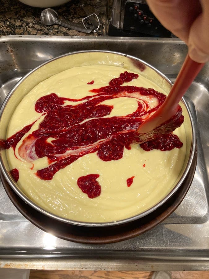 swirling the raspberry into the batter