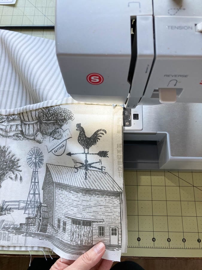 Sewing on the apron pocket