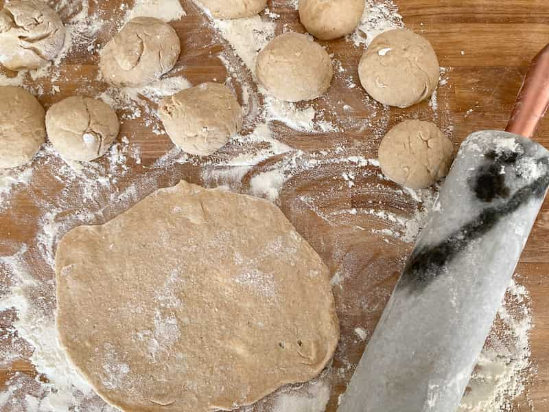 Preparing sourdough flatbread pita bread