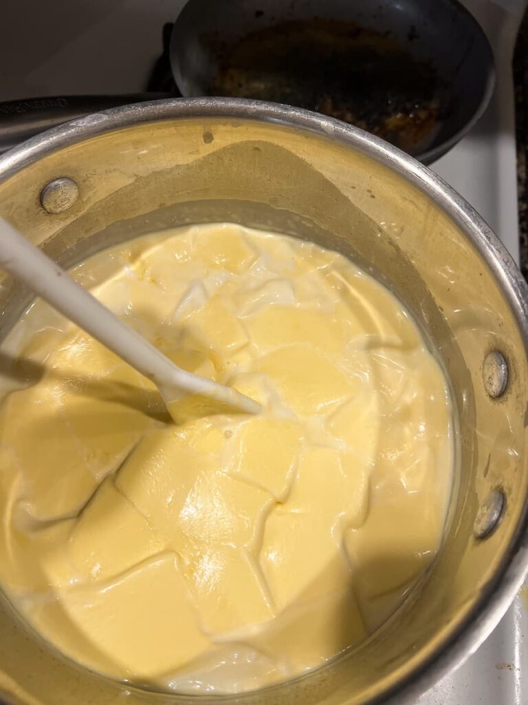 stirring the curds